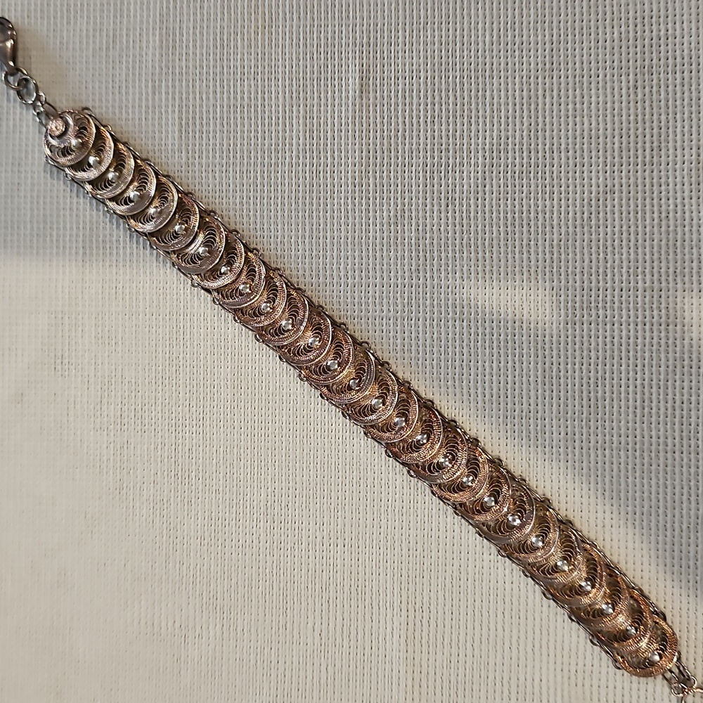 Elegant Gold and Silver Bracelet